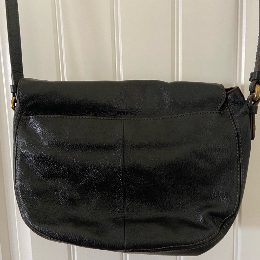 Fossil black cross body bag.